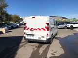 a white van that is parked in a parking lot