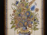 a picture of a picture of a vase of flowers