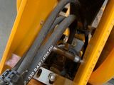 a close up of a machine with wires attached to it