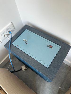 a blue box sitting on top of a table in a room