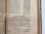 an open book that is sitting on a table