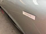 a sticker on the door of a car that says vauto