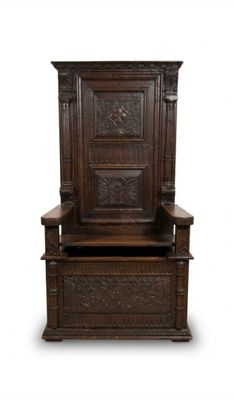 une image représentant une chaise en bois avec un dossier sculpté