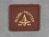 a close up of a leather patch with a star on it