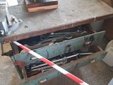 a machine that is sitting on a table in a garage