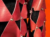 an image of a close up of a red and black jacket