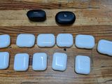 a wooden table that has a bunch of white objects on it