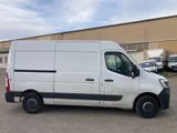a white van that is parked in a parking lot
