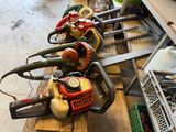 many chainsaws that are lined up on a pallet