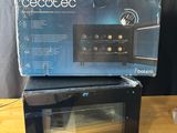 the box of the oven is open and ready to be used