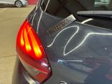 a car that has a sticker on the back of it