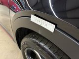 a picture of a car with a sticker on the side of it