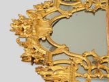a mirror that is sitting on a table