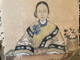 a painting of a woman sitting at a table playing a musical instrument