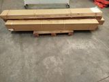 a pile of boxes sitting on a pallet in a warehouse