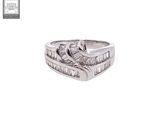 an image of a ring with baguets and diamonds on a white background