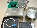 many different types of cooking utensils and pans