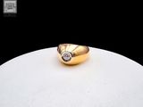 an image of a gold ring with a diamond on it