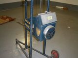 a small machine that is sitting on the floor