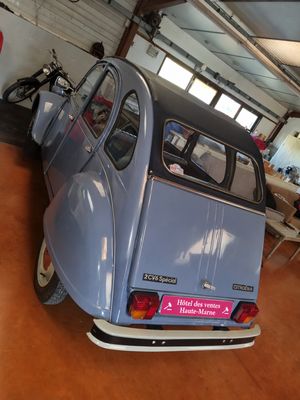 a small car that is parked in a garage