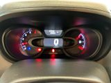 a close up of the dashboard of a car with the lights on