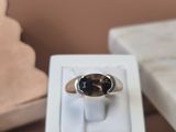 a ring that is sitting on top of a white box