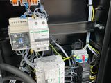 many wires and switches in this electrical cabinet