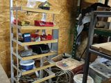 a room that has a shelf with many items on it