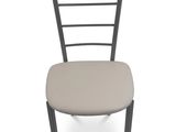 a close up of a chair with a cushion on it