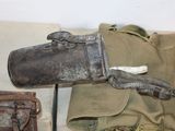 a pair of gloves and a bag sitting on a table