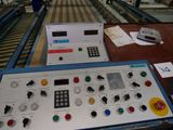an image of a control panel on a conveyor belt in a factory