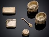 an image of a group of silver objects including a spoon, a lighter, and a lighter case