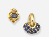 une photo d'une paire de boucles d'oreilles en saphir et diamant