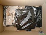 a cardboard box filled with a lot of clothing