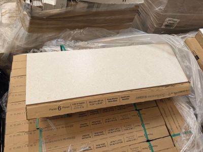 a pile of boxes and boxes of cardboard on the ground