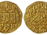 deux pièces d'or portant une écriture arabe