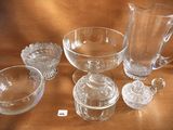 a lot of glass items that are on a table
