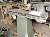 a picture of a machine that is working on a piece of wood