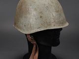 a close up of a helmet on a mannequin head