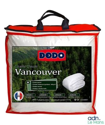a close up of a bag with a blanket on top of it