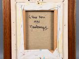 a close up of a picture of a picture frame with writing on it