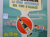a poster on the wall of a building advertising a tour