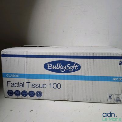 a box of facial tissue sitting on a table