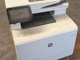a printer that is sitting on top of a pallet