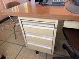 an image of a desk with a computer and a laptop on it