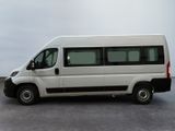 a white van that is parked on the side of the road