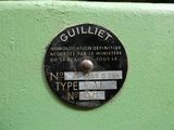 a close up of a sign on a green machine