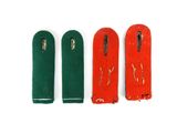 three pairs of red, green, and gold scissors on a white surface