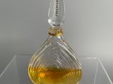 a glass bottle with a liquid inside of it