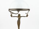 an image of a lamp with a glass shade on top of it